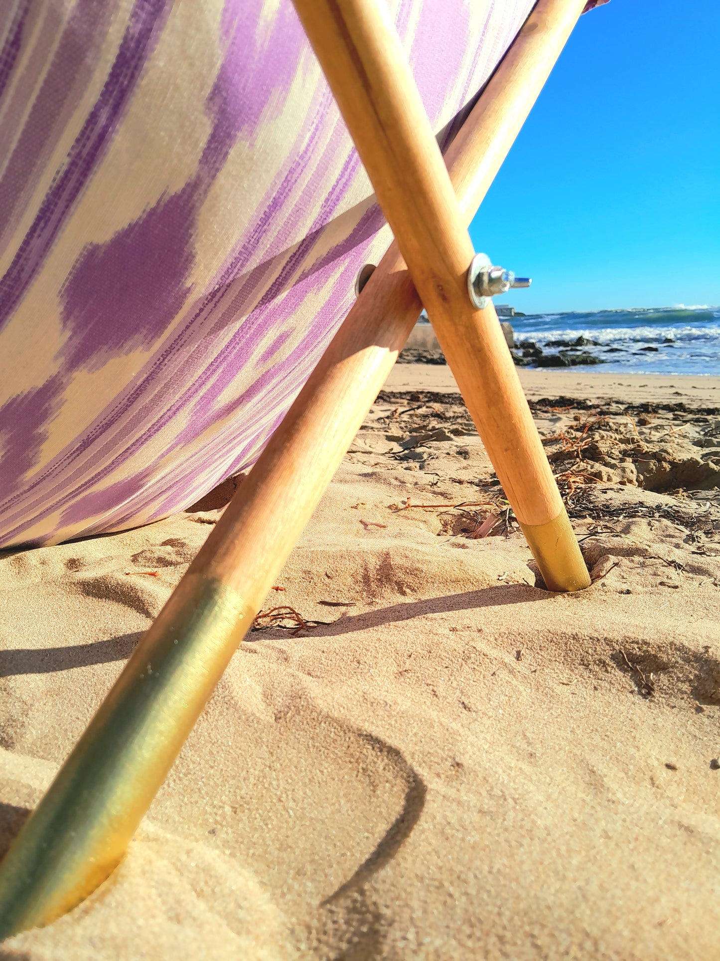 Lona tumbona artesanal para playa ikat lila hecha en Mallorca -